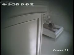 A concealed camera in a hotel room captured a wife being beaten and masturbated.